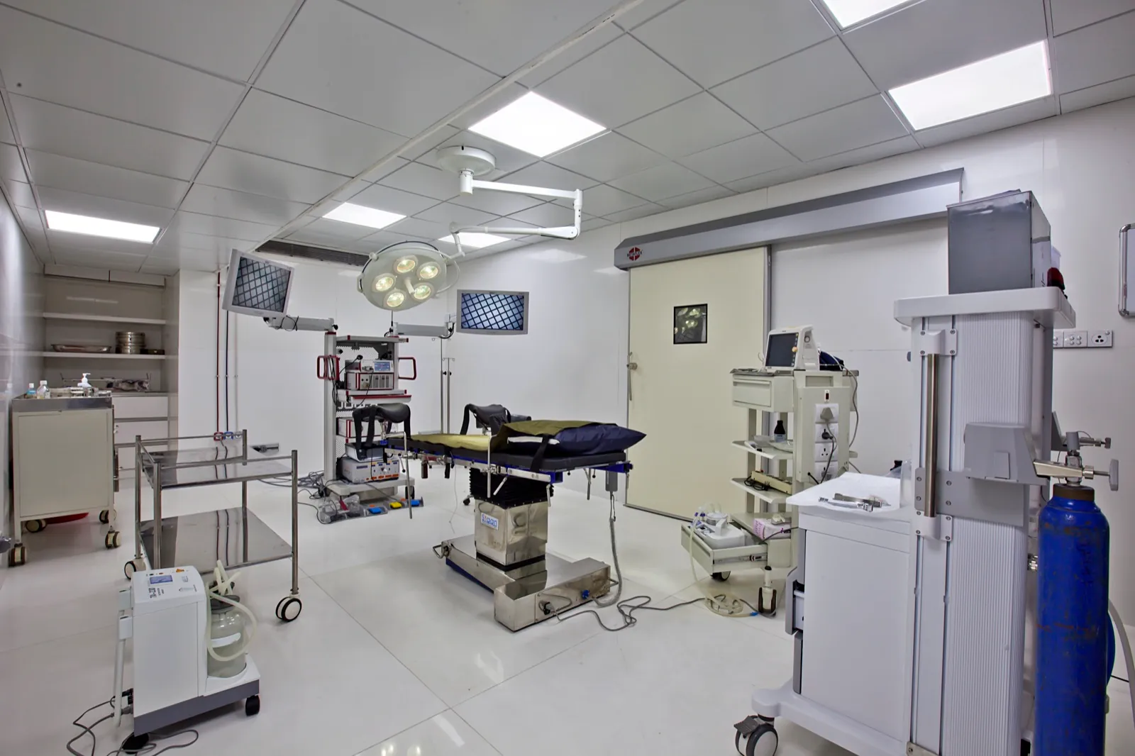 An operation theatre with surgical and monitoring equipment